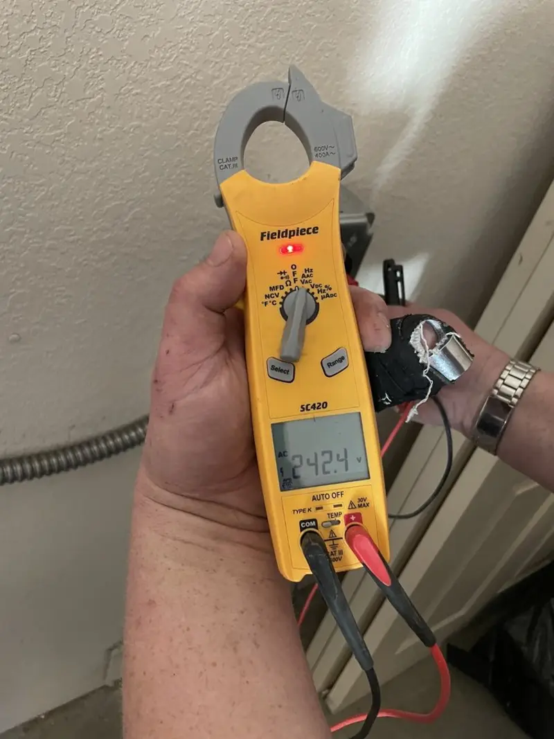 Voltage testing with clamp meter during Generator Installation in Newberg